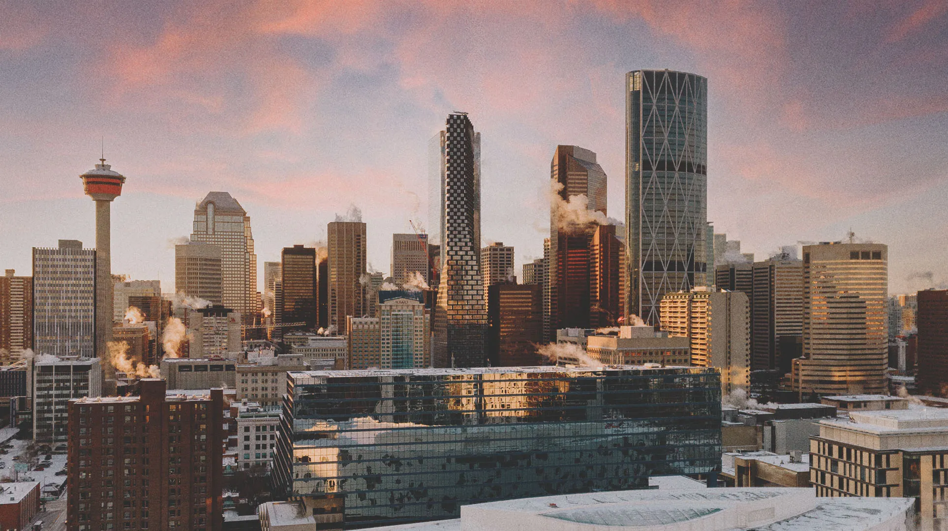 downtown Calgary skyline during winter with a beautiful pink sky