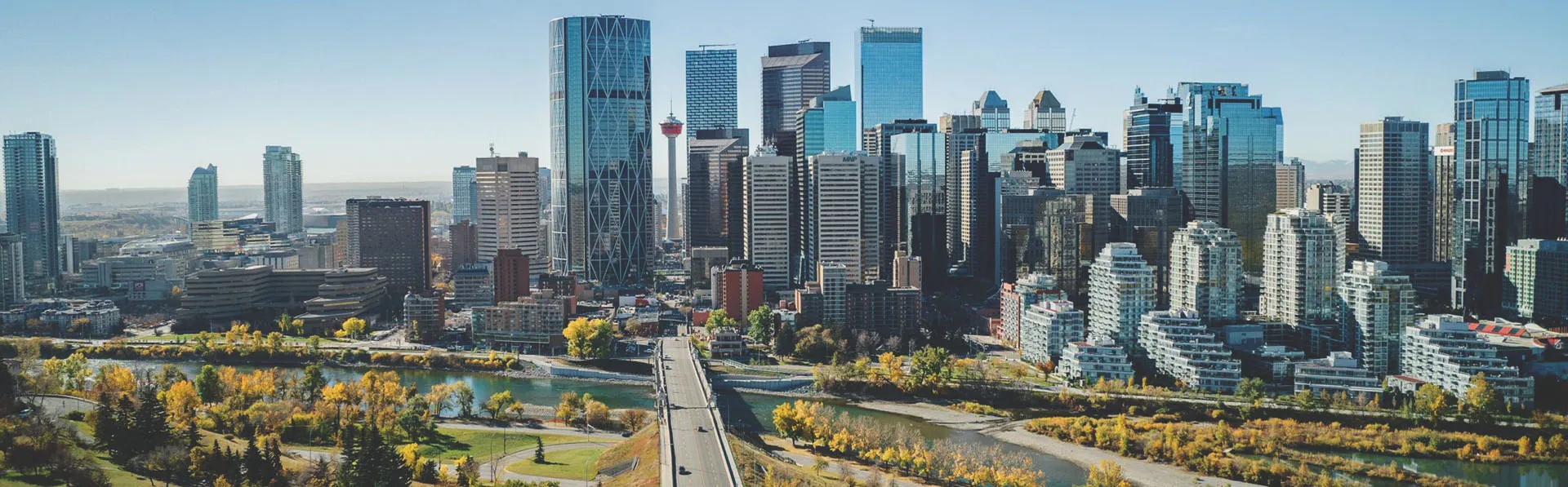 aerial of the Calgary skyline looking down Centre street during late summer
