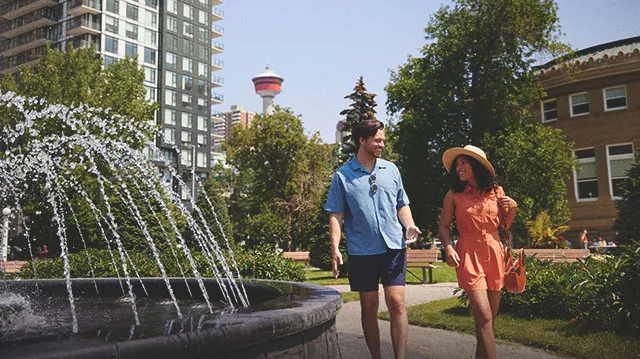 couple exploring Calgary's parks in full bloom during spring