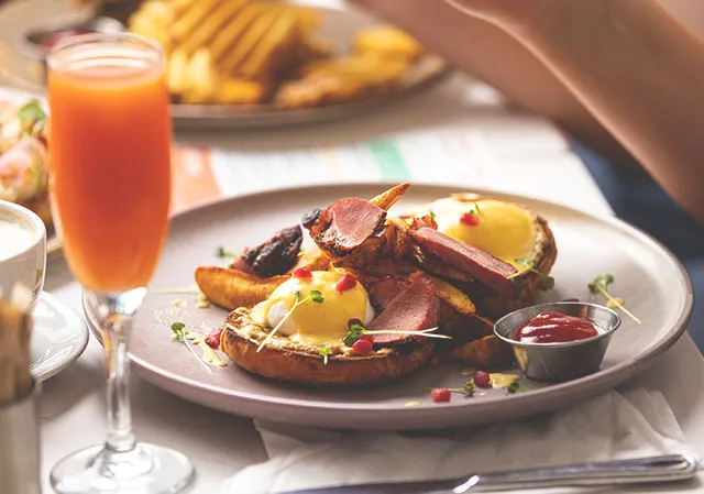 Benny and mimosa at OEB Breakfast Co.