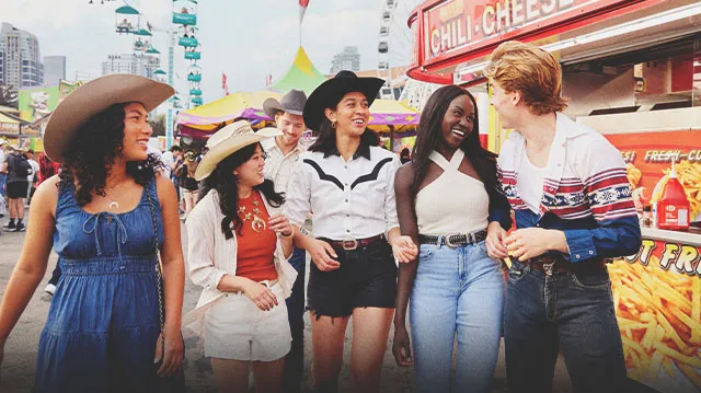 group of friends exploring the Calgary Stampede grounds