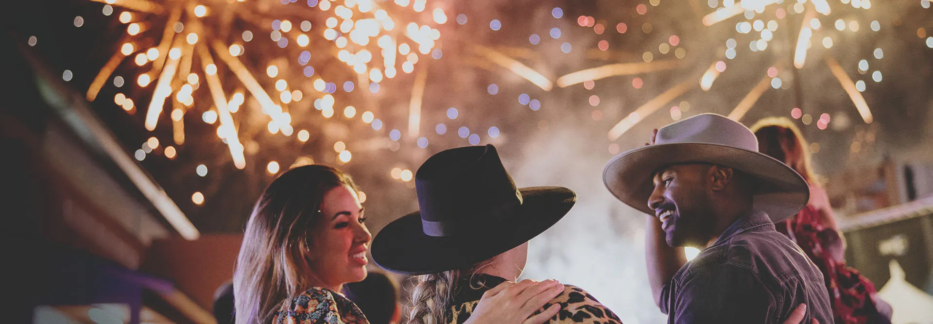friends watching the Fireworks Extravaganza at Calgary Stampede