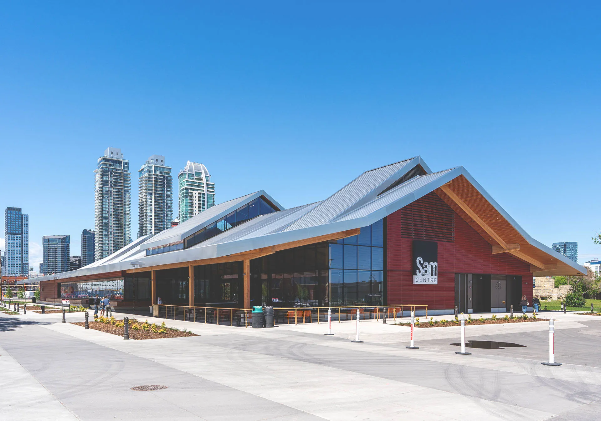 Exterior of Sam Centre with the downtown skyline in the background