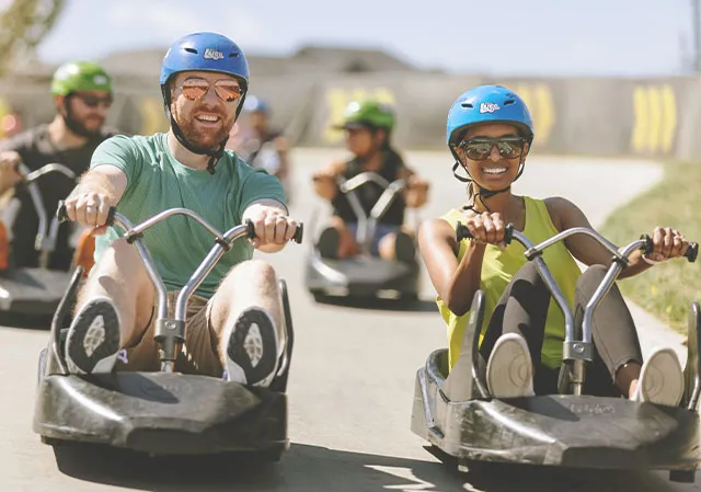 Two people at downhill karting