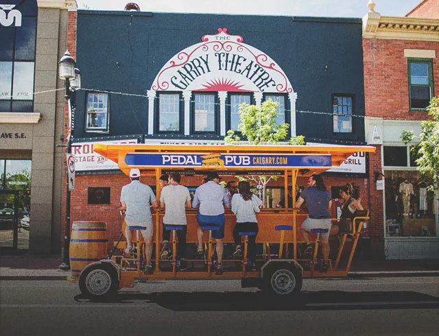 Team on a peddle pub tour