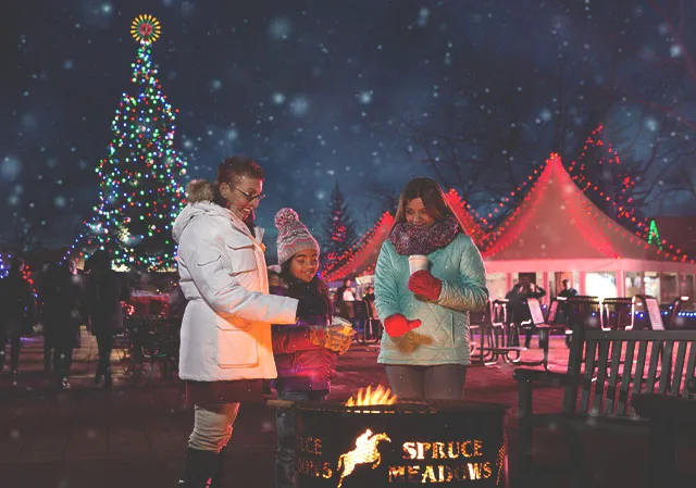 Fire pits and hot chocolate keep guests warm during breaks from shopping at Spruce Meadows Christmas Market