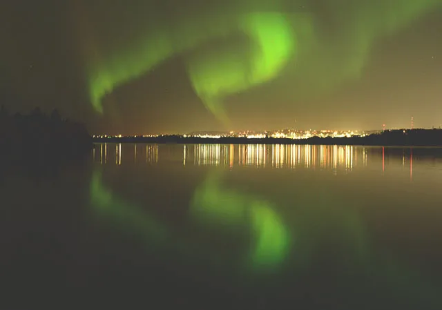 The northern lights dazzle above the Glenmore Reservoir