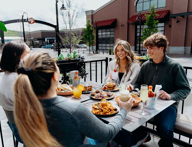 group of friends enjoying brunch at Monki Breakfast Club & Bistro Inglewood