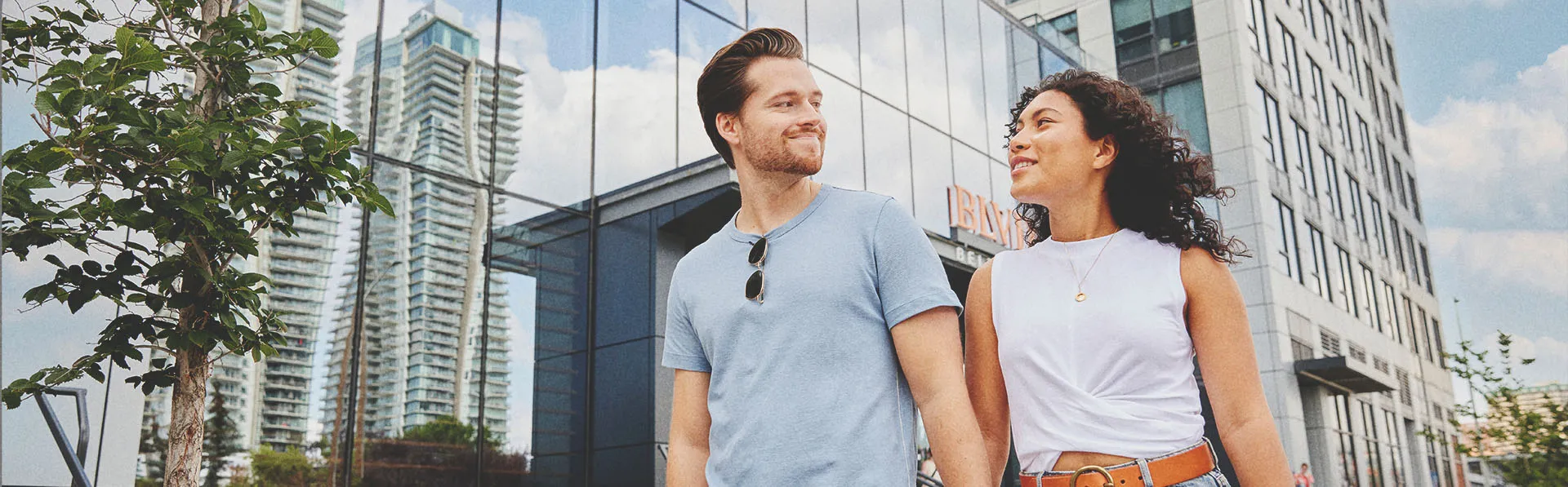 couple walking hand in hand in the Beltline