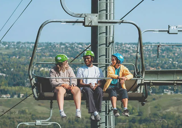 Group of friends enjoying amazing views of Calgary’s skyline