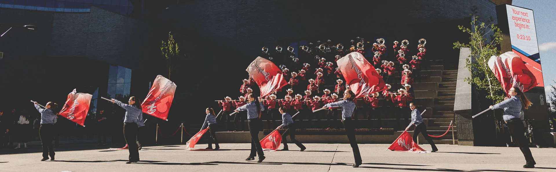 Group performing in front of the BMO Centre