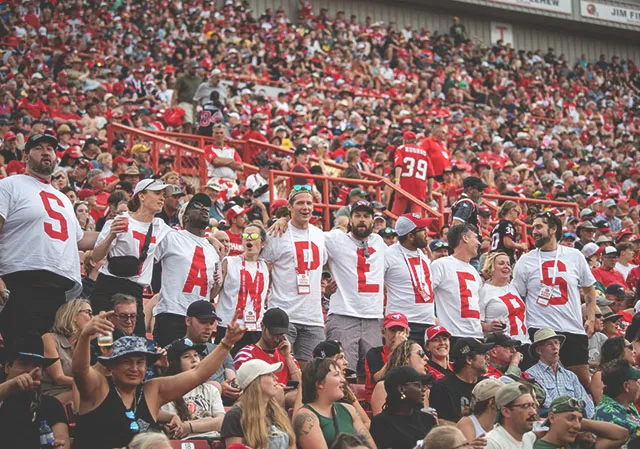 Stamps fans cheering at the stadium
