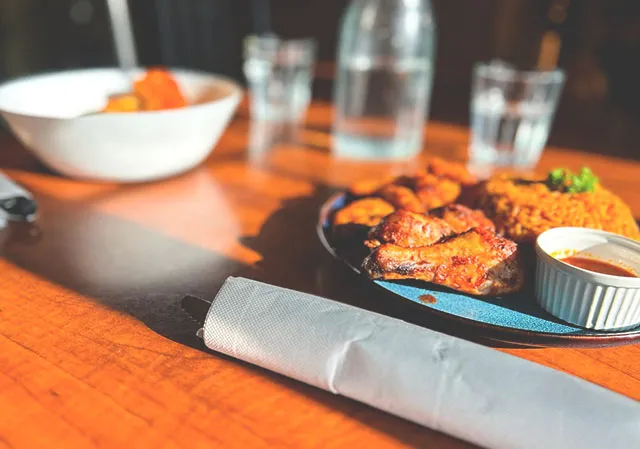 Efo riro with pounded yam and jollof rice with chicken are both favourites at Ahnike’s Restaurant