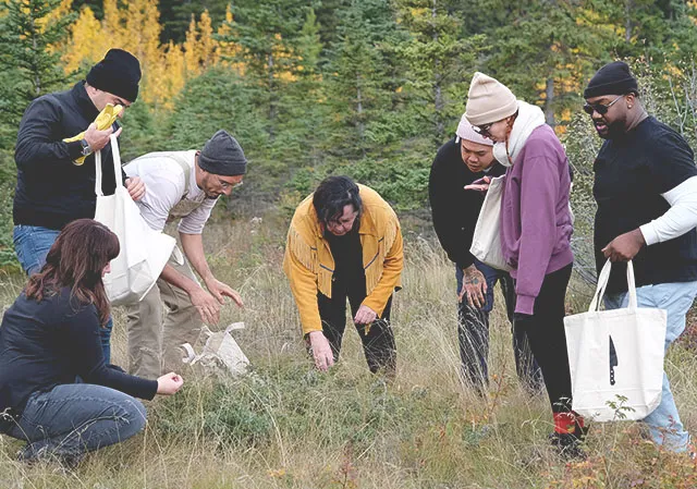 The cheftestants touring with Cree/ Iroquois knowledge-keeper Brenda Holder
