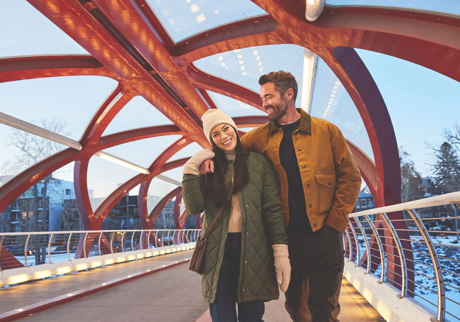 Couple walking on the Peace Bridge